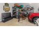 Spacious garage with storage shelving, bike, and car at 7145 Hanging Rock Ct, Denver, NC 28037