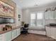 Bright home office with window seat and built-in cabinetry at 7145 Hanging Rock Ct, Denver, NC 28037