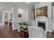 Fireplace and comfortable seating area in the living room at 7145 Hanging Rock Ct, Denver, NC 28037