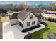 Two-story house with driveway and attached garage, viewed from above at 719 Greenbriar Dr, Matthews, NC 28104