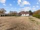 Large backyard with grassy area at 719 Greenbriar Dr, Matthews, NC 28104