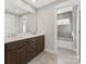 Double vanity bathroom with a shower/tub combo at 719 Greenbriar Dr, Matthews, NC 28104