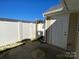 Private patio with storage shed and fenced backyard at 104 Lassiter Ct, Mount Holly, NC 28120