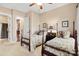 Charming bedroom with two twin beds, nightstands, and plenty of natural light at 1132 Cades Ct, Denver, NC 28037