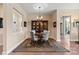 Charming dining room with antique furniture and decorative rug at 1132 Cades Ct, Denver, NC 28037