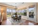 Bright dining room with table and chairs, access to the backyard at 1132 Cades Ct, Denver, NC 28037