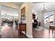 Elegant entryway with views into the home office and living room at 1132 Cades Ct, Denver, NC 28037