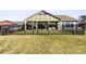 House exterior showcasing a backyard with a black fence at 1132 Cades Ct, Denver, NC 28037