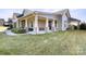 House exterior showcasing a front porch and manicured lawn at 1132 Cades Ct, Denver, NC 28037