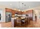 Modern kitchen featuring stainless steel appliances and hardwood floors at 1132 Cades Ct, Denver, NC 28037