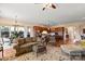 Open living room with access to kitchen and dining areas at 1132 Cades Ct, Denver, NC 28037