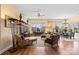 Open living space with seating area, hardwood floors, and views to the dining area at 1132 Cades Ct, Denver, NC 28037