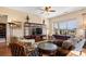 Relaxing living room featuring comfy seating, a large TV, and ample natural light at 1132 Cades Ct, Denver, NC 28037
