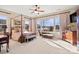 Spacious main bedroom with a four-poster bed and large windows at 1132 Cades Ct, Denver, NC 28037