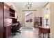 Home office with hardwood floors and built-ins at 1132 Cades Ct, Denver, NC 28037