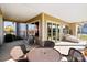 Outdoor patio with seating area and glass doors leading inside at 1132 Cades Ct, Denver, NC 28037