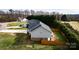 Well-maintained home with a fenced backyard, and lush lawn at 118 Cypress Acres Ln, Statesville, NC 28625