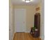 Inviting entryway with coat rack, storage bench and durable flooring at 118 Cypress Acres Ln, Statesville, NC 28625