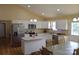 Bright kitchen with stainless steel appliances, center island and granite countertops at 118 Cypress Acres Ln, Statesville, NC 28625