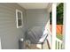 Covered outdoor patio area with a grill, offering a relaxed space for cooking out at 118 Cypress Acres Ln, Statesville, NC 28625