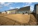 Large backyard with privacy fence and patio area at 1844 Giana Ln, Monroe, NC 28112
