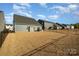 Spacious backyard with fenced area, patio, and grill at 1844 Giana Ln, Monroe, NC 28112