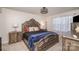 Elegant bedroom with a large bed and ornate furniture at 1844 Giana Ln, Monroe, NC 28112