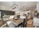 Kitchen and dining area with modern light fixtures and decor at 1844 Giana Ln, Monroe, NC 28112