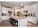 Modern kitchen with white cabinets, granite counters, and island at 1844 Giana Ln, Monroe, NC 28112