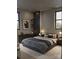 Modern bedroom with a king bed, sleek furniture, and lots of natural light at 206 Fox Den Rd, Troy, NC 27371