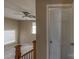Spacious bonus room features neutral walls, ceiling fan, and natural light from multiple windows at 206 Fox Den Rd, Troy, NC 27371
