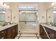 Spa-like bathroom featuring a large shower and double vanity at 274 Hemlock Bluff Ct, Denver, NC 28037