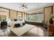 Main bedroom with large window, built-in window seat, and hardwood floors at 274 Hemlock Bluff Ct, Denver, NC 28037