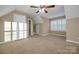 Spacious bedroom with vaulted ceiling, ceiling fan and window with shutters at 3297 Su San Farms Rd, Gastonia, NC 28056