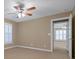 Spacious bedroom with ceiling fan and access to another room at 3297 Su San Farms Rd, Gastonia, NC 28056