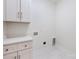 Bright laundry room with white cabinets and countertop at 350 White Jenkins Rd, Bessemer City, NC 28016