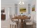 Elegant dining room with a large wooden table, decorative chandelier, and tasteful wall art at 4774 Looking Glass Trl, Denver, NC 28037