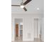 Hallway featuring a ceiling fan and access to other rooms at 4774 Looking Glass Trl, Denver, NC 28037