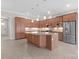 Spacious kitchen with a central island, stainless steel appliances, and custom cabinetry at 4774 Looking Glass Trl, Denver, NC 28037