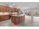 Modern kitchen featuring a spacious island with granite countertops and stainless steel appliances at 4774 Looking Glass Trl, Denver, NC 28037