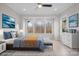 Bright bedroom with a large window, ceiling fan, and sleek white dresser at 4774 Looking Glass Trl, Denver, NC 28037