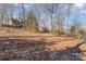 Wooded backyard with a view of the lake at 5403 Shoreview Dr, Concord, NC 28025