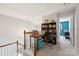 Upstairs office area with built-in shelving and desk at 5430 Allison Ln, Charlotte, NC 28277