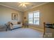 Comfortable bedroom with neutral tones, large window, and plenty of space for a desk or seating area at 5981 Bison Ct, Fort Mill, SC 29707
