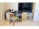 Home office space with desk, chair, and shelves, perfect for remote work or study at 5981 Bison Ct, Fort Mill, SC 29707