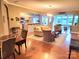 Open-concept living space connecting the kitchen and living room area, with a dining area on the left at 5981 Bison Ct, Fort Mill, SC 29707