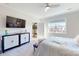 Spacious bedroom with large window, a dresser and a flat-screen TV at 602 Compass Dr, Denver, NC 28037