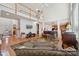 Bright living room with hardwood floors, a fireplace, and views of the upper level at 1102 High Brook Dr, Waxhaw, NC 28173