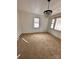 Bright dining room with new carpet and chandelier at 111 Dye St, Chester, SC 29706