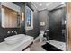 Sleek bathroom with vanity, walk-in shower and black subway tile at 124 Saylors Watch Ln, Mooresville, NC 28117